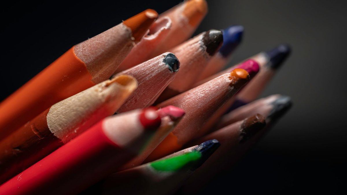 A close-up of pencils on a dark background representing an aggressive playstyle