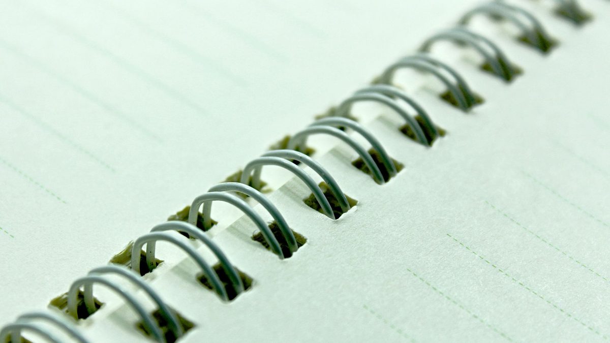 Close-up of the spiral binding on a notebook