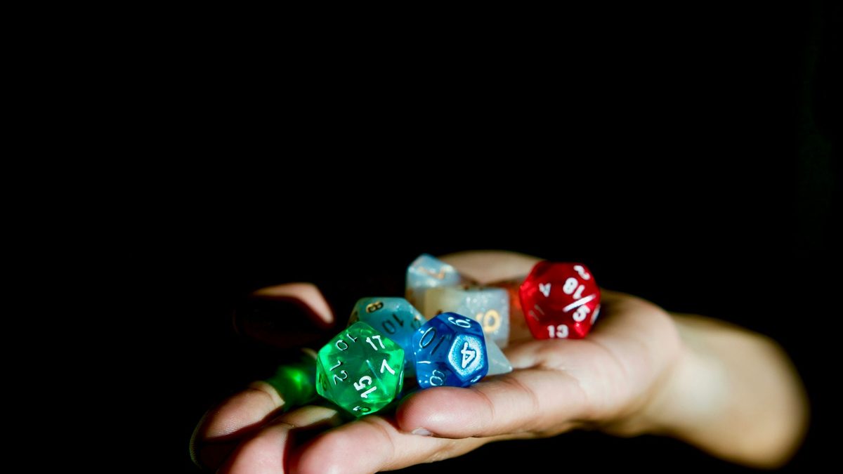 Different types and sizes of dice arranged together