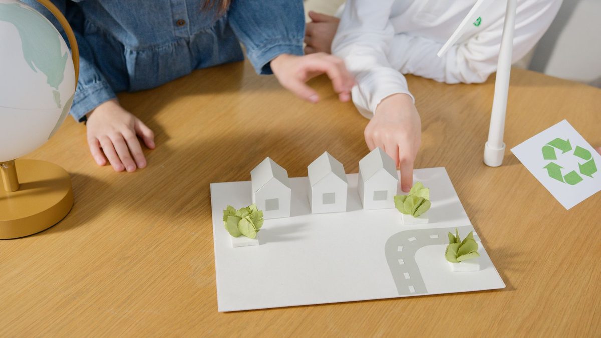 Children doing crafts and making things at a table