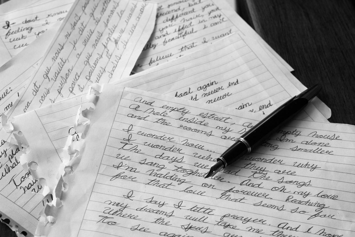 A page of joined handwriting practice worked in pencil