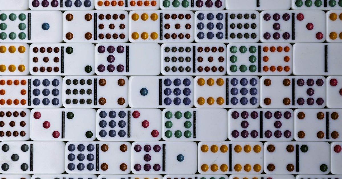 Colourful dice scattered together on a table