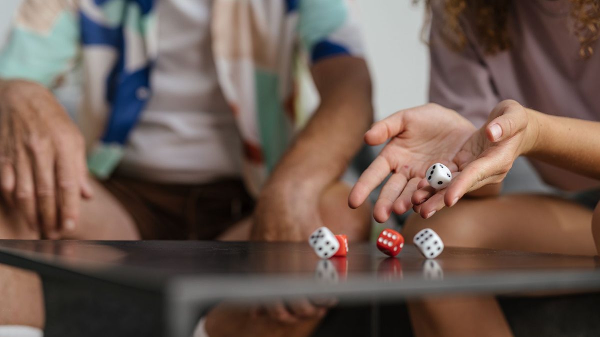 Close-up of dice on a table used for a probability game