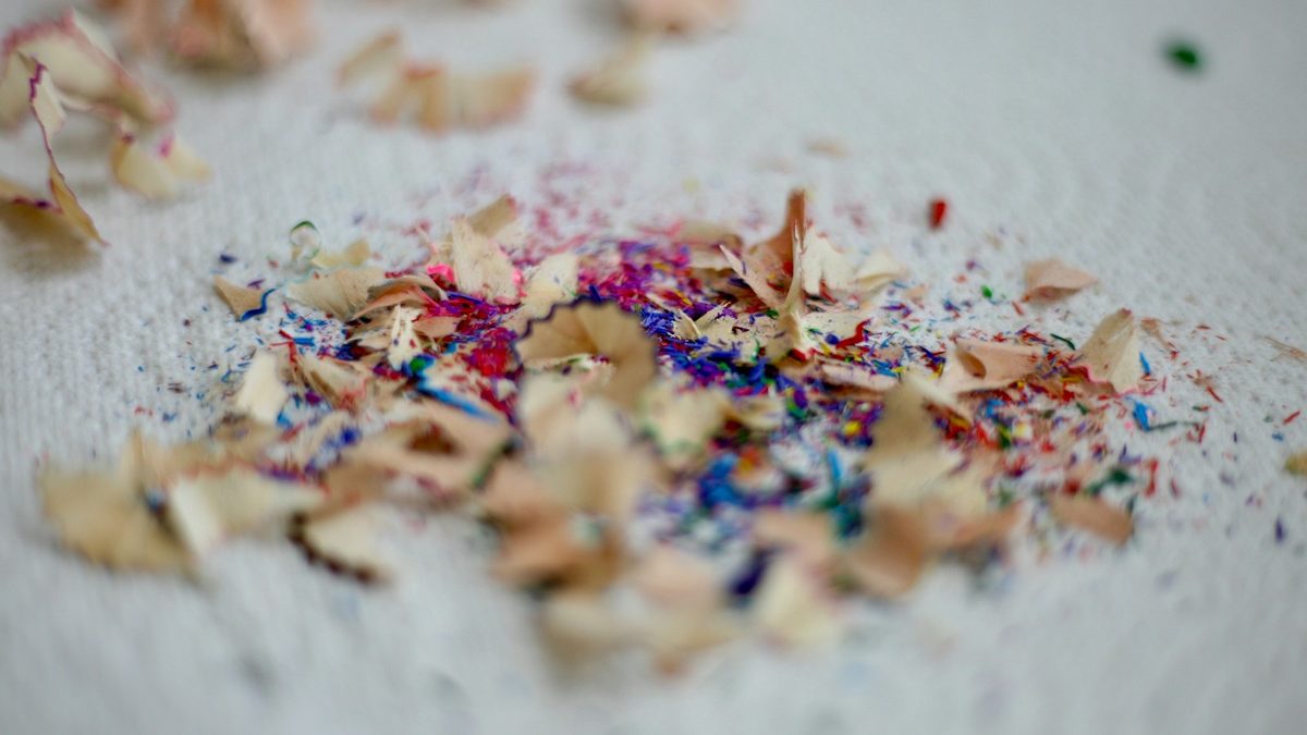 Eraser shavings and smudged pencil marks on paper