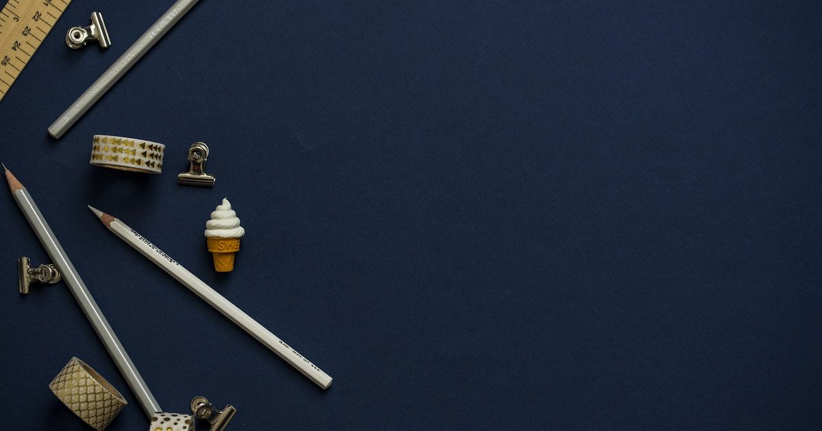 Several erasers photographed together on a plain background