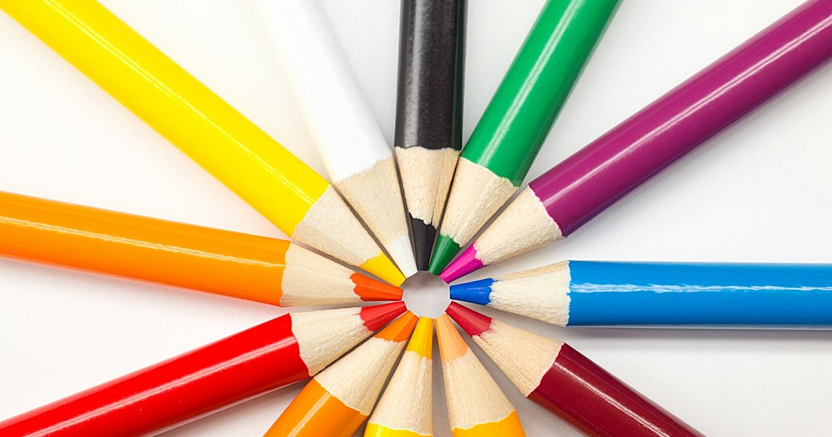 A set of bright sharpened pencils arranged neatly together