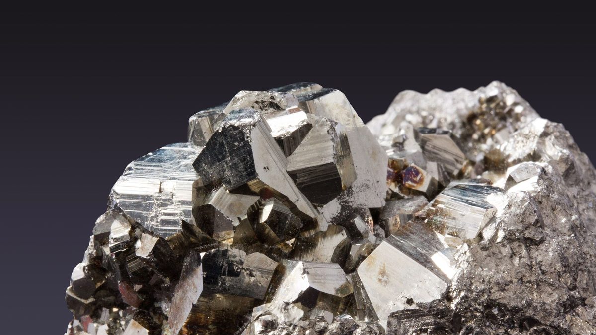 A shiny sample of graphite mineral photographed close up