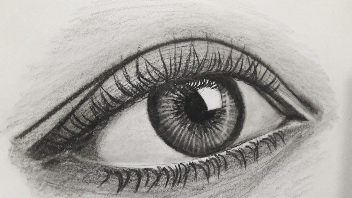 A long continuous pencil line drawn across white paper
