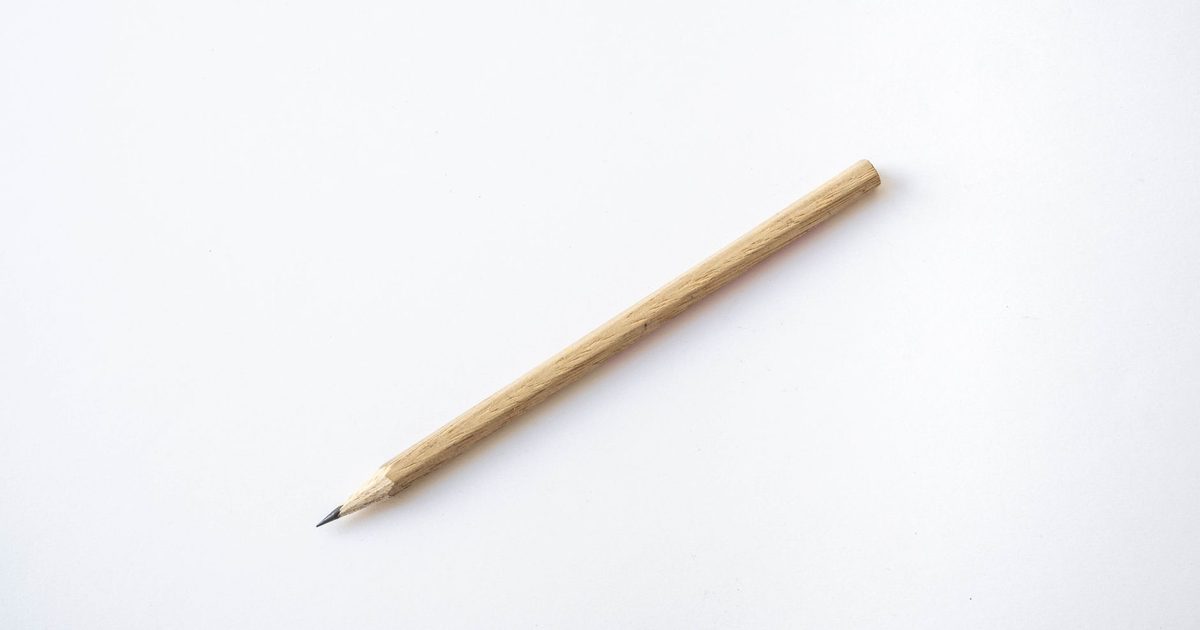 A stack of new unsharpened wooden pencils arranged together