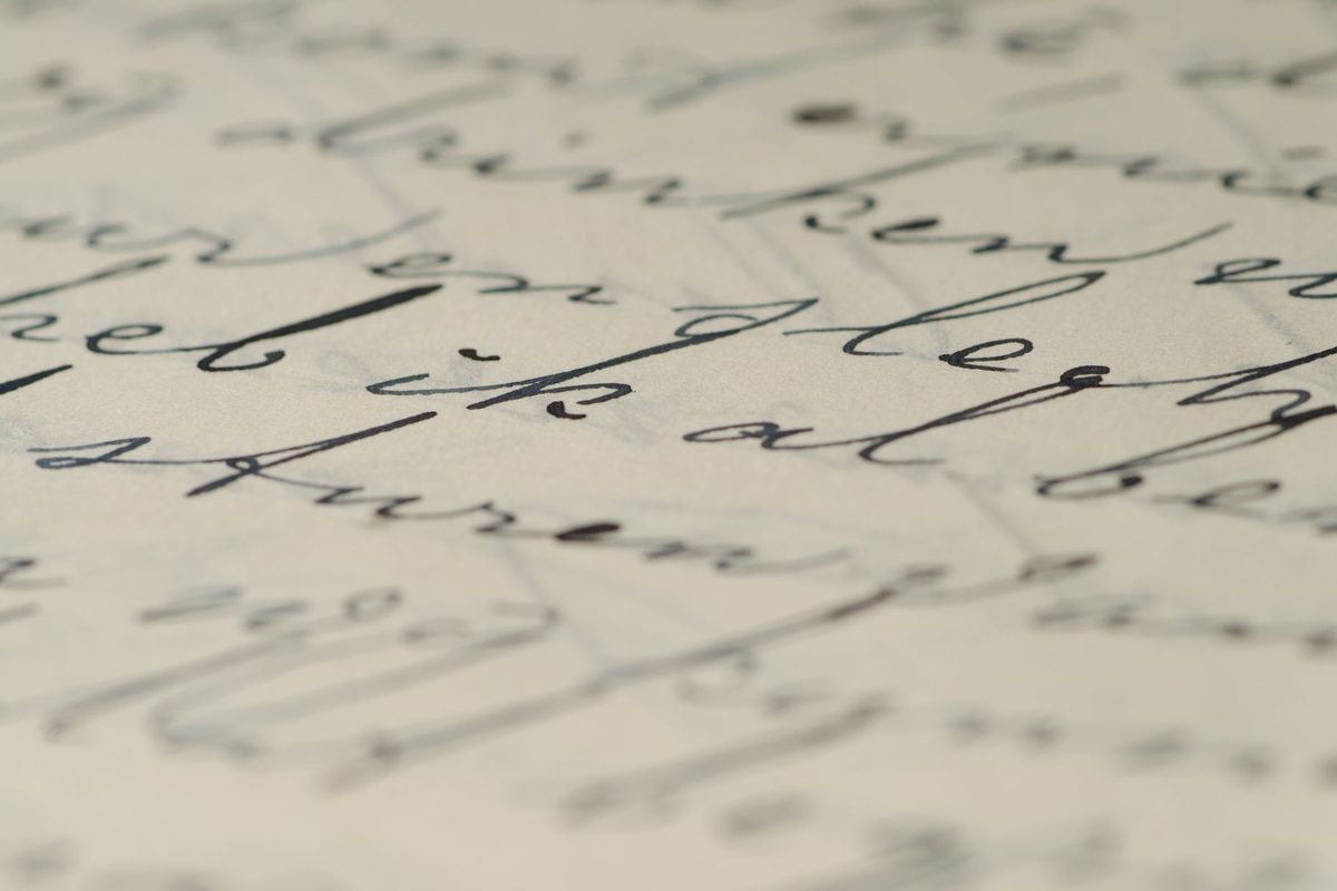Close-up of flowing joined handwriting showing the connections between letters