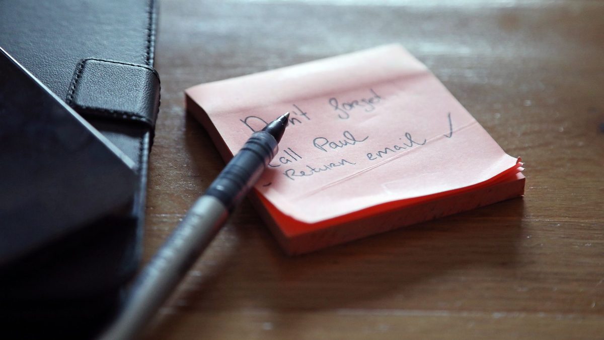 A handwritten note left on a classroom desk