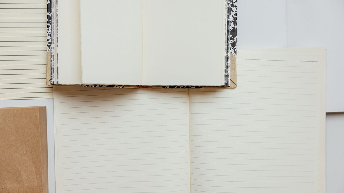 Wide-ruled handwriting practice lines on paper