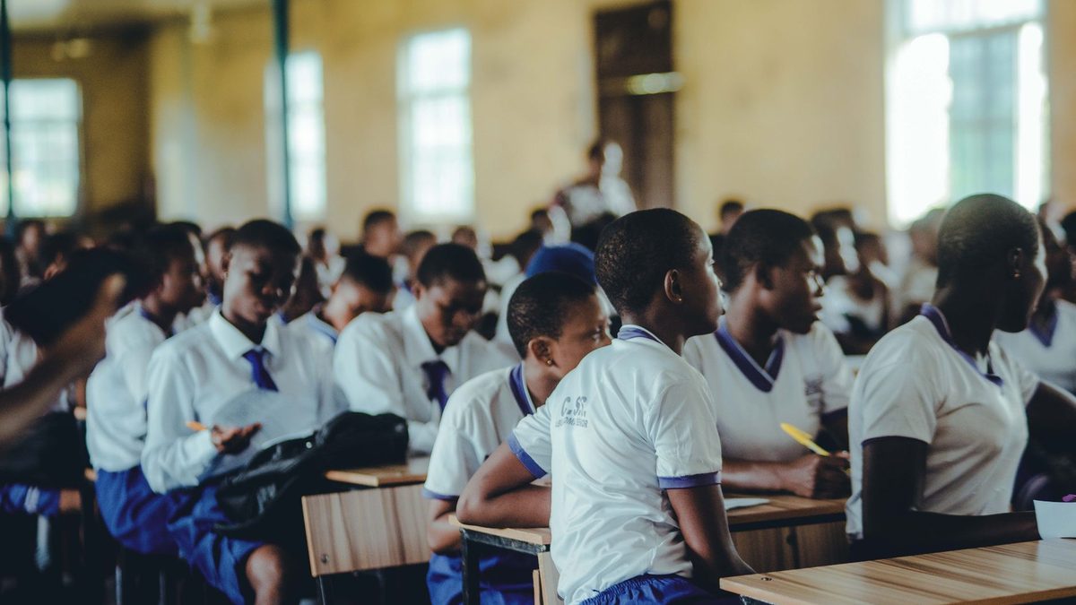 A classroom of pupils working at their desks at different speeds