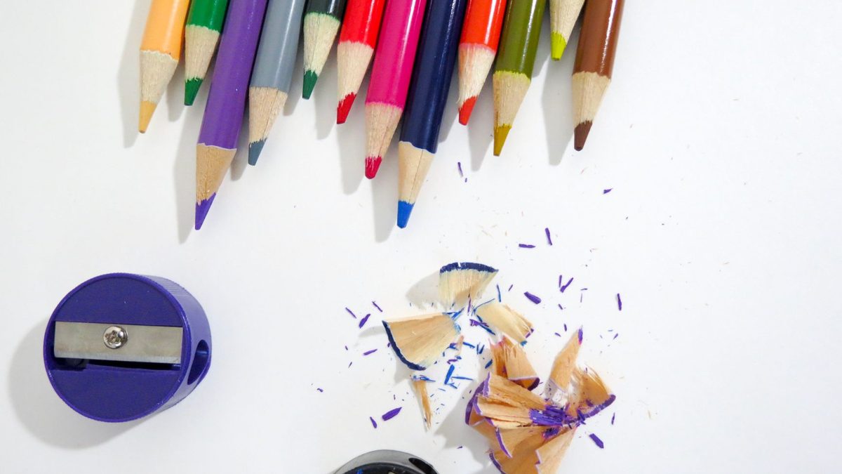 An electric pencil sharpener sitting on a desk