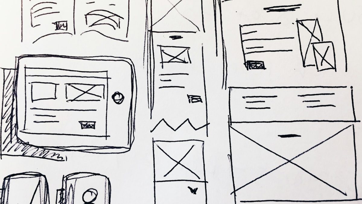 A notebook page covered in hand-drawn sketches and doodles