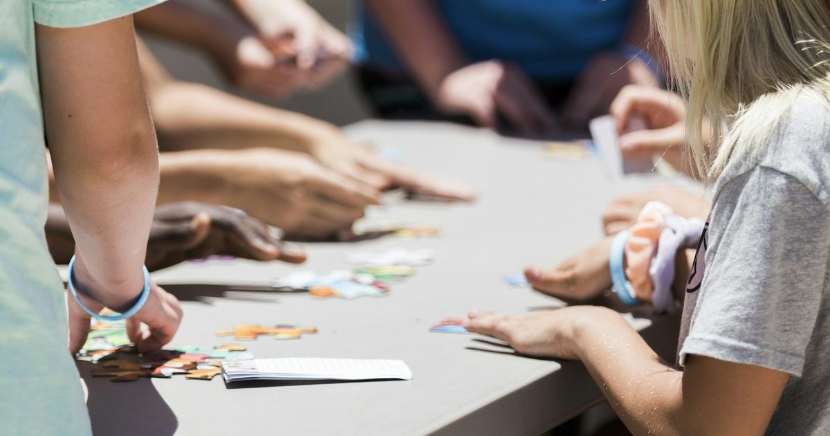 A child concentrating during a matching memory game