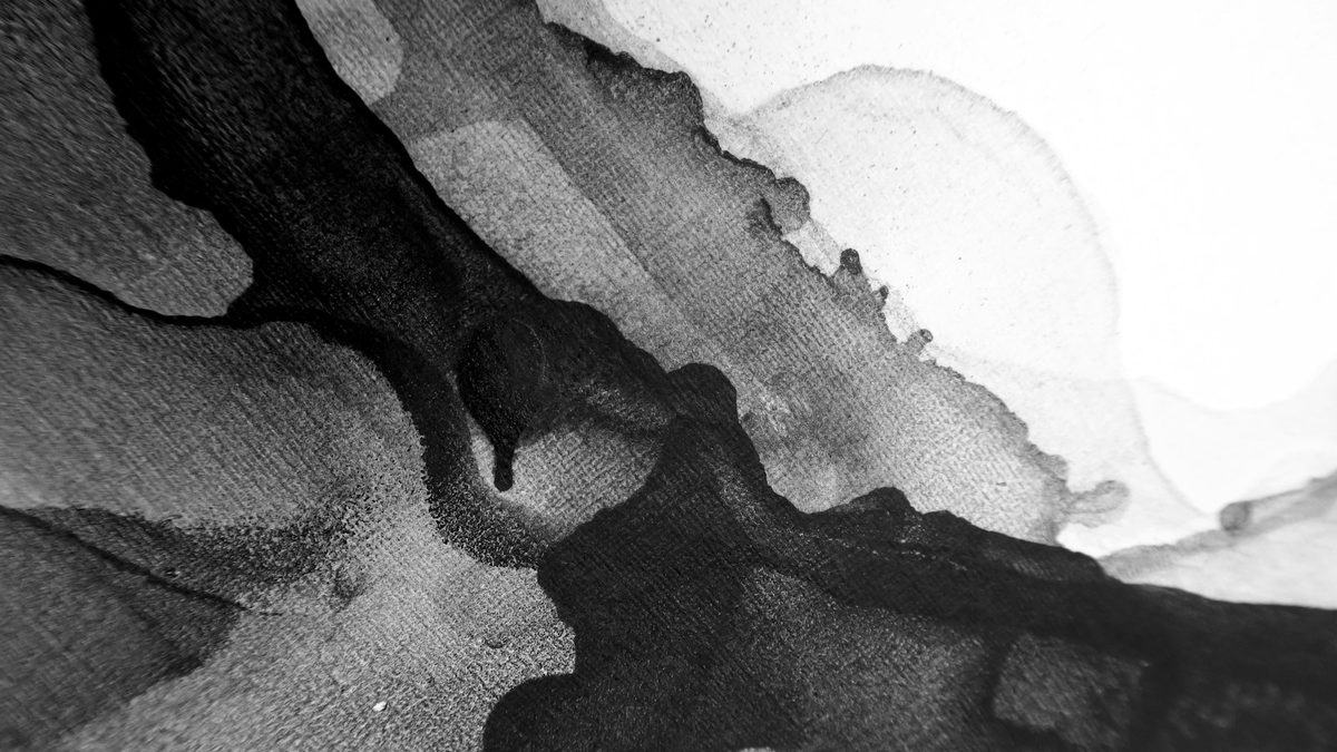 Ink showing through from the reverse of a thin sheet of paper