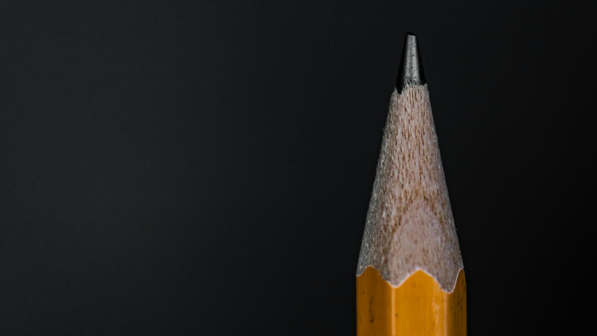 Macro photograph of a pencil eraser and ferrule in close detail