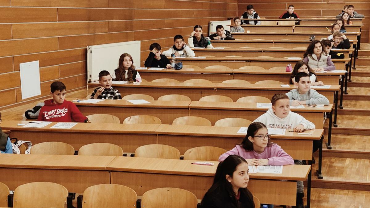 Pupils returning to their desks and settling after a break