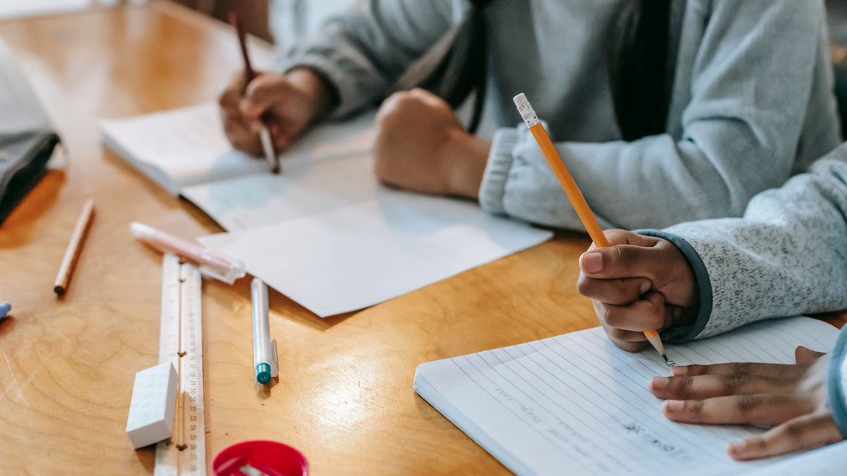 Pupils working with paper and pencils rather than screens