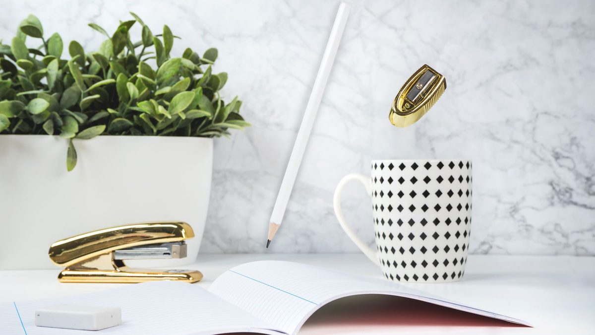 A distinctive gold-toned pencil among stationery, representing a rare chase pencil