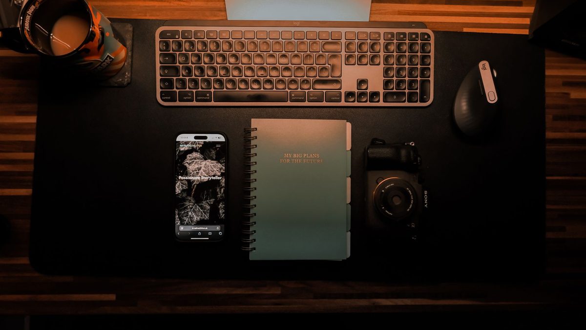 A phone placed face down on a desk to remove distractions