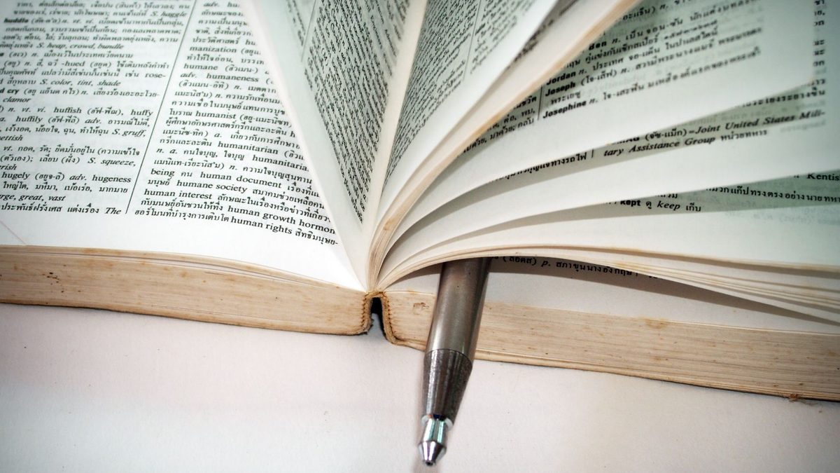 An open dictionary showing a page of words