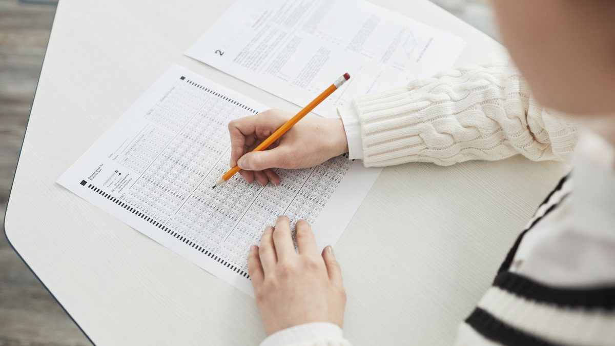 A multiple choice exam answer sheet with a pencil