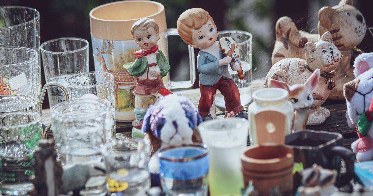 A child showing a collection of small objects they have gathered